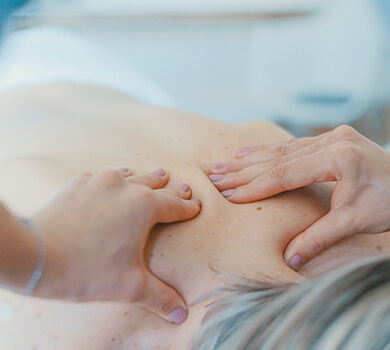 Shoulder massage on a mature adult